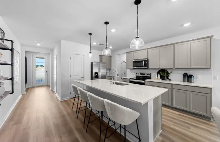 Photos are from a furnished model.