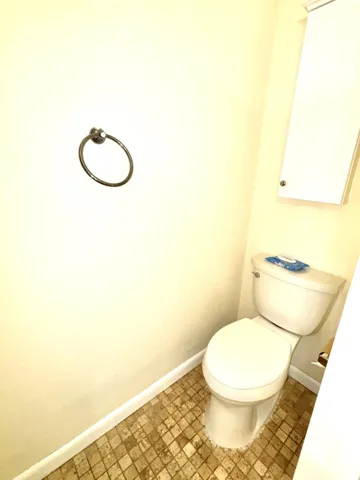 Toilet in upstairs full bathroom