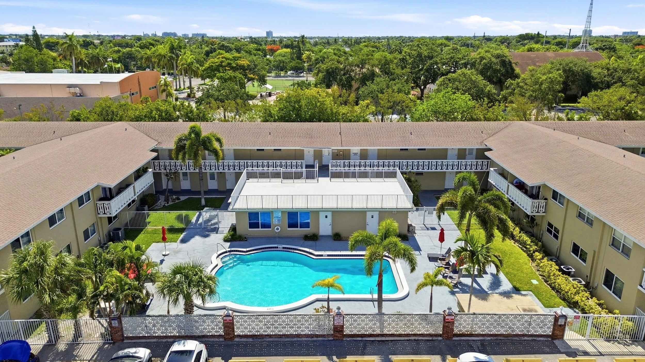 Experience the charm of this beautifully maintained Delray Beach community featuring lush tropical landscaping, abundant parking, expansive green spaces, and a recently renovated resort-style pool with an oversized sundeck. Designed around a welcoming courtyard setting, the community offers residents a peaceful atmosphere while remaining just minutes from the beach, Atlantic Avenue, shopping, dining, golf, and everyday conveniences. The attractive layout, manicured grounds, and inviting outdoor amenities create the perfect blend of comfort, convenience, and relaxed South Florida living.