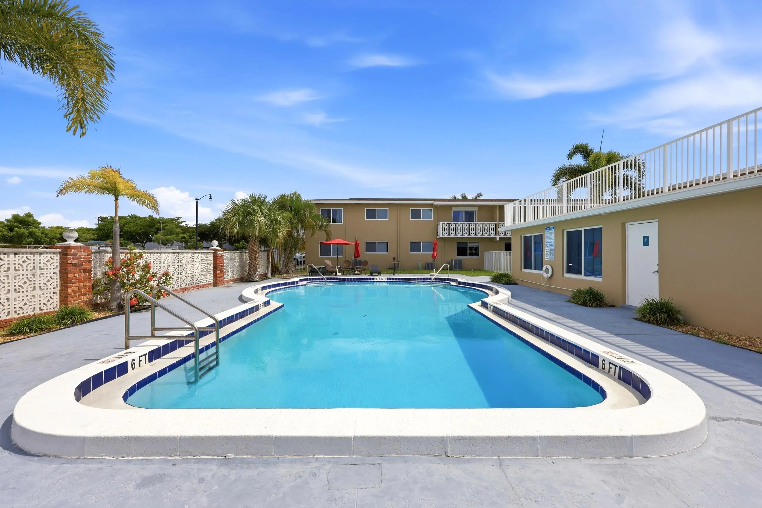 The resort-style community pool and sundeck provide the perfect setting to relax and enjoy South Florida's year-round sunshine. Recently renovated in 2025, the pool area features expansive deck space, tropical landscaping, lounge seating, and shaded gathering areas ideal for socializing with neighbors or unwinding after a day at the beach. Surrounded by swaying palm trees and well-maintained grounds, this inviting outdoor amenity creates a peaceful retreat just steps from home. The building was freshly painted in 2024, further enhancing the pride of ownership throughout the community.