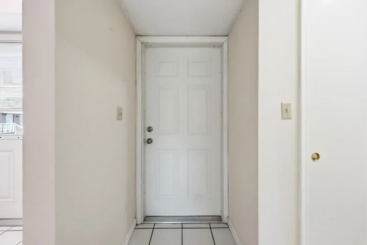 A covered front entry welcomes you home and provides a private entrance to this second-floor residence. The bright interior foyer creates a smooth transition into the main living areas while offering a convenient space for greeting guests and everyday arrivals.
