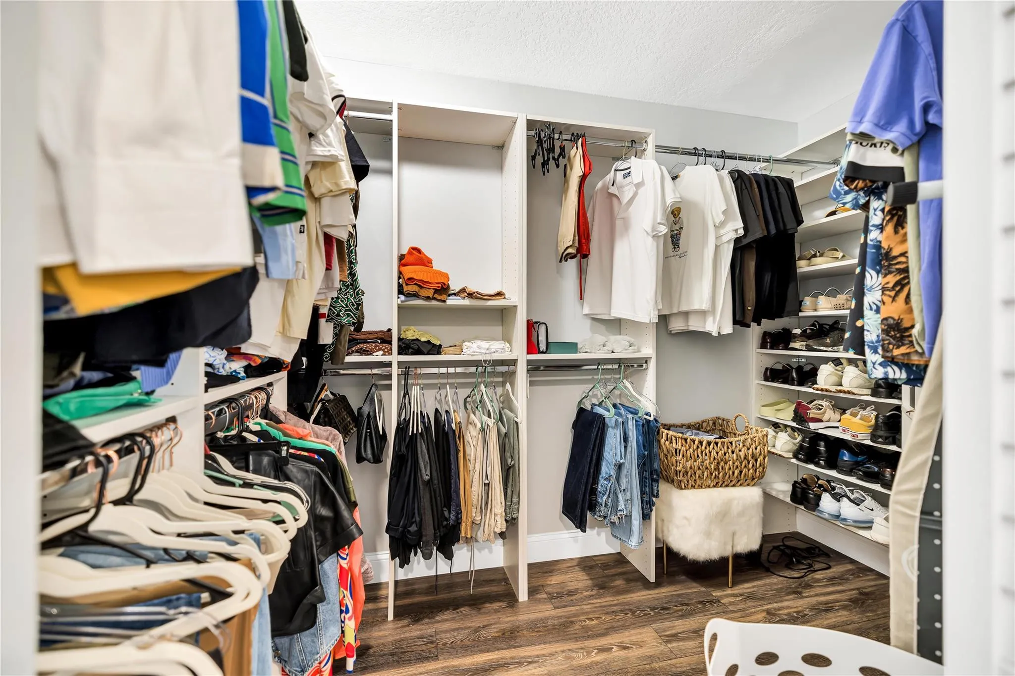 Custom closet built-ins provide the best utilization of the space, while keeping everything organized.