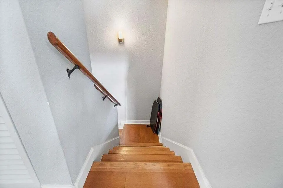 STAIRS TO BEDROOM AND BATHS