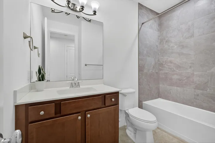 Shared Full Bathroom with Tub