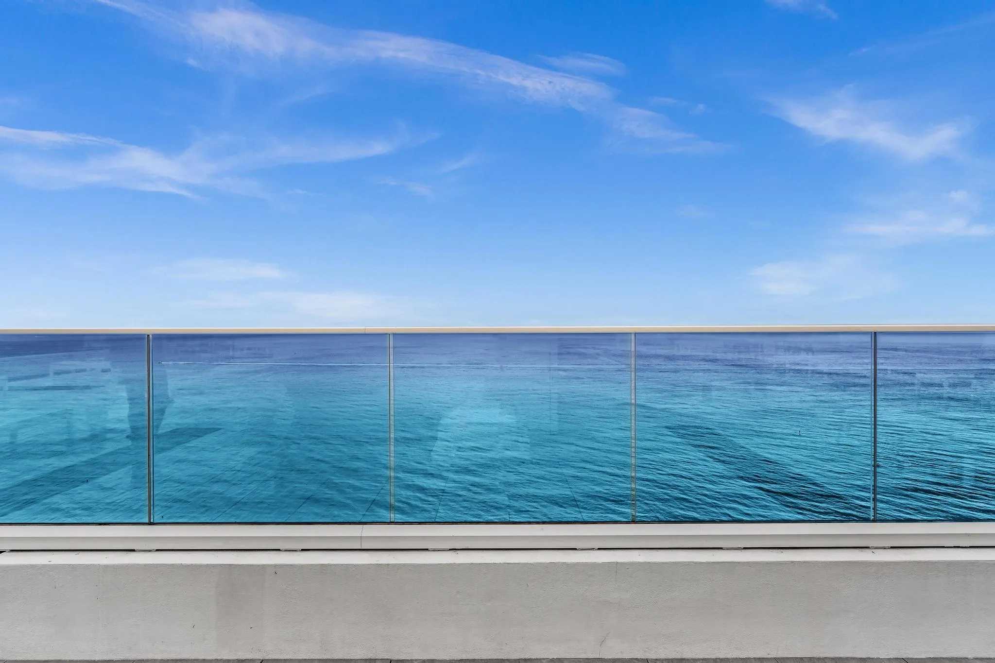 Glass Railing Enhance the panoramic views from the pool deck