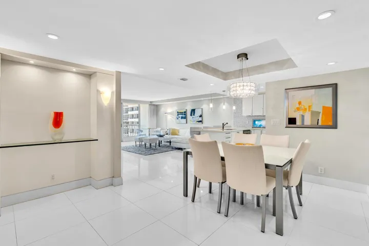 Dining Room with Tray Ceiling and Recessing Lighting