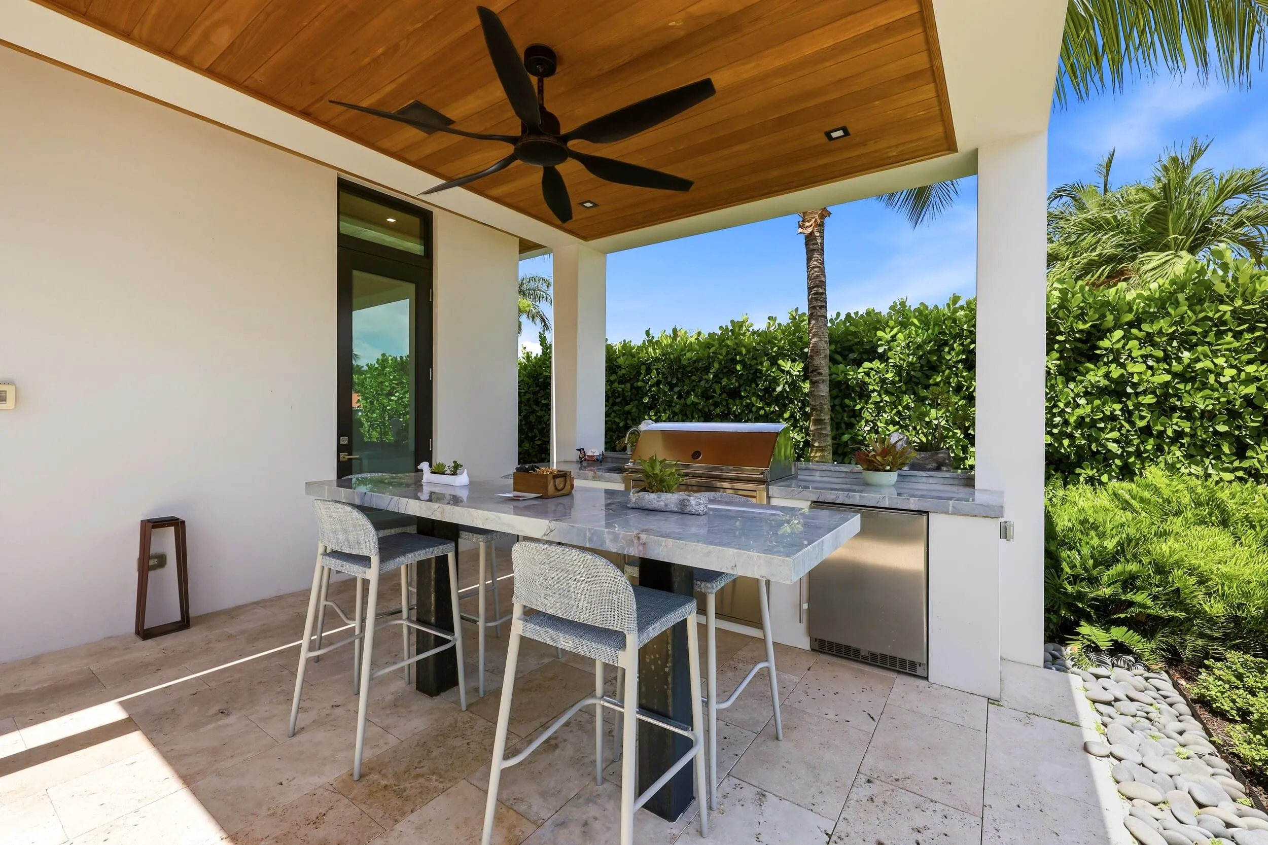 Custom Outdoor Kitchen With Beverage Refrigerator & Ice maker