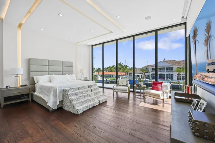 1500 Sqft Primary Suite With Custom Lighting and Direct Water Views