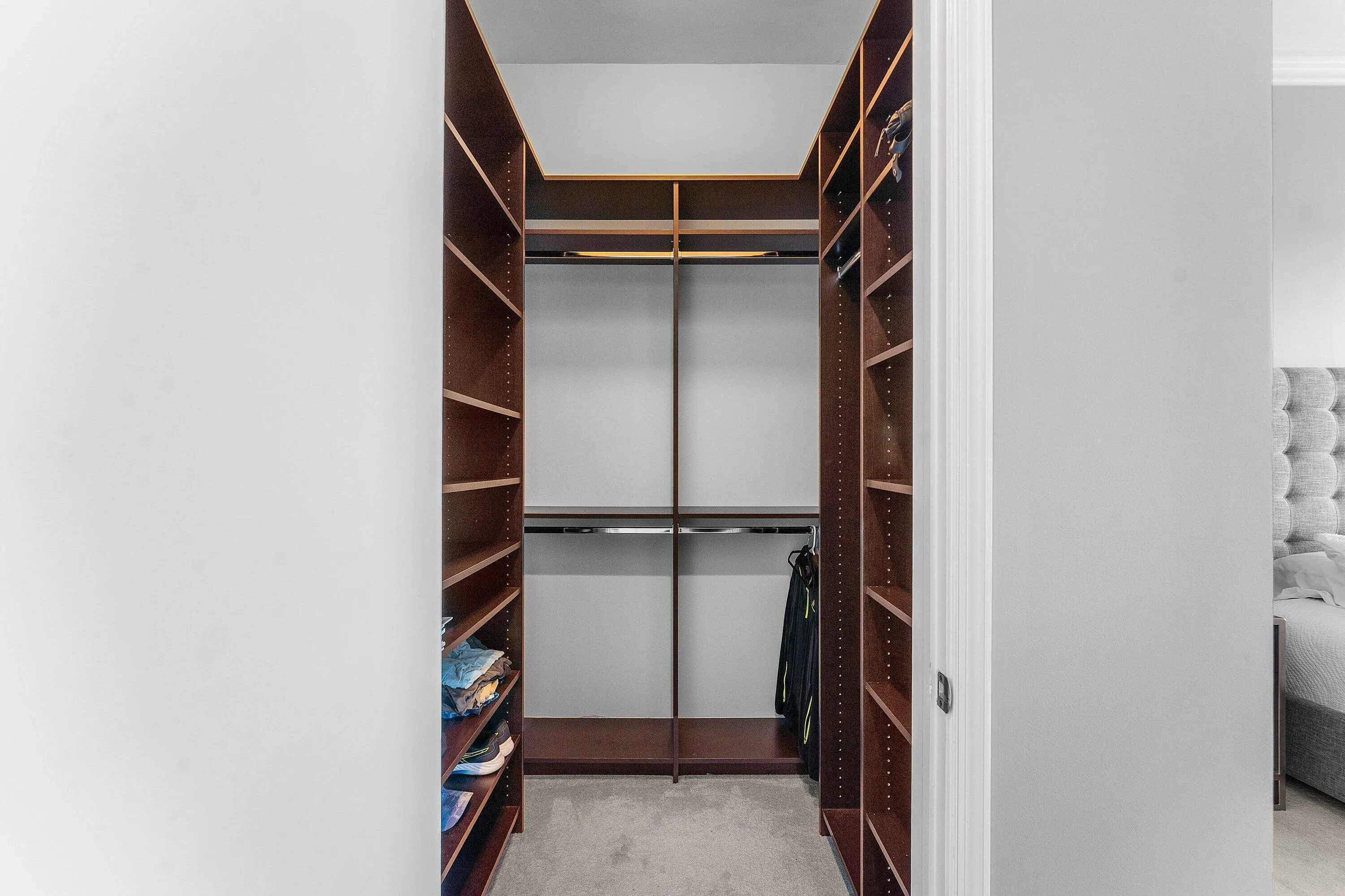 1 of 2 Walk-In Closets in Primary
