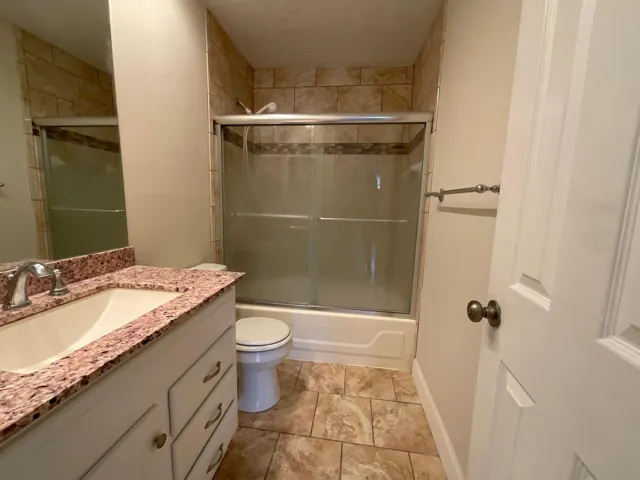 Bathroom 1 with tub and shower