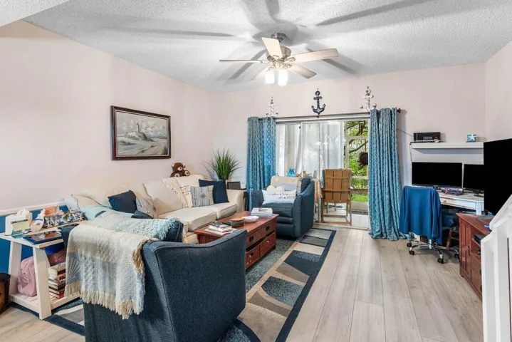 Living with sliding door to screen porch