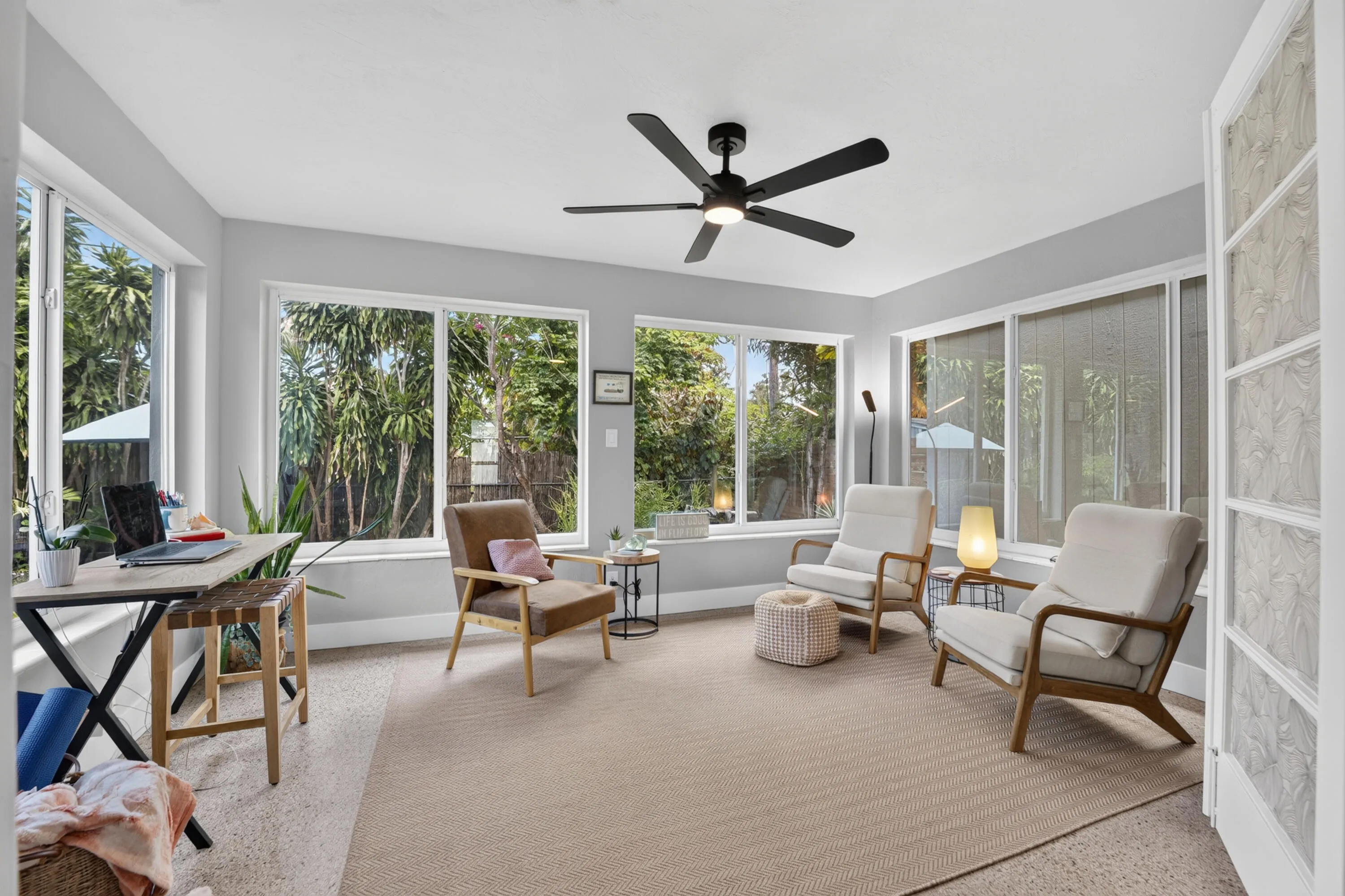 Florida room could be additional living area, dining or office