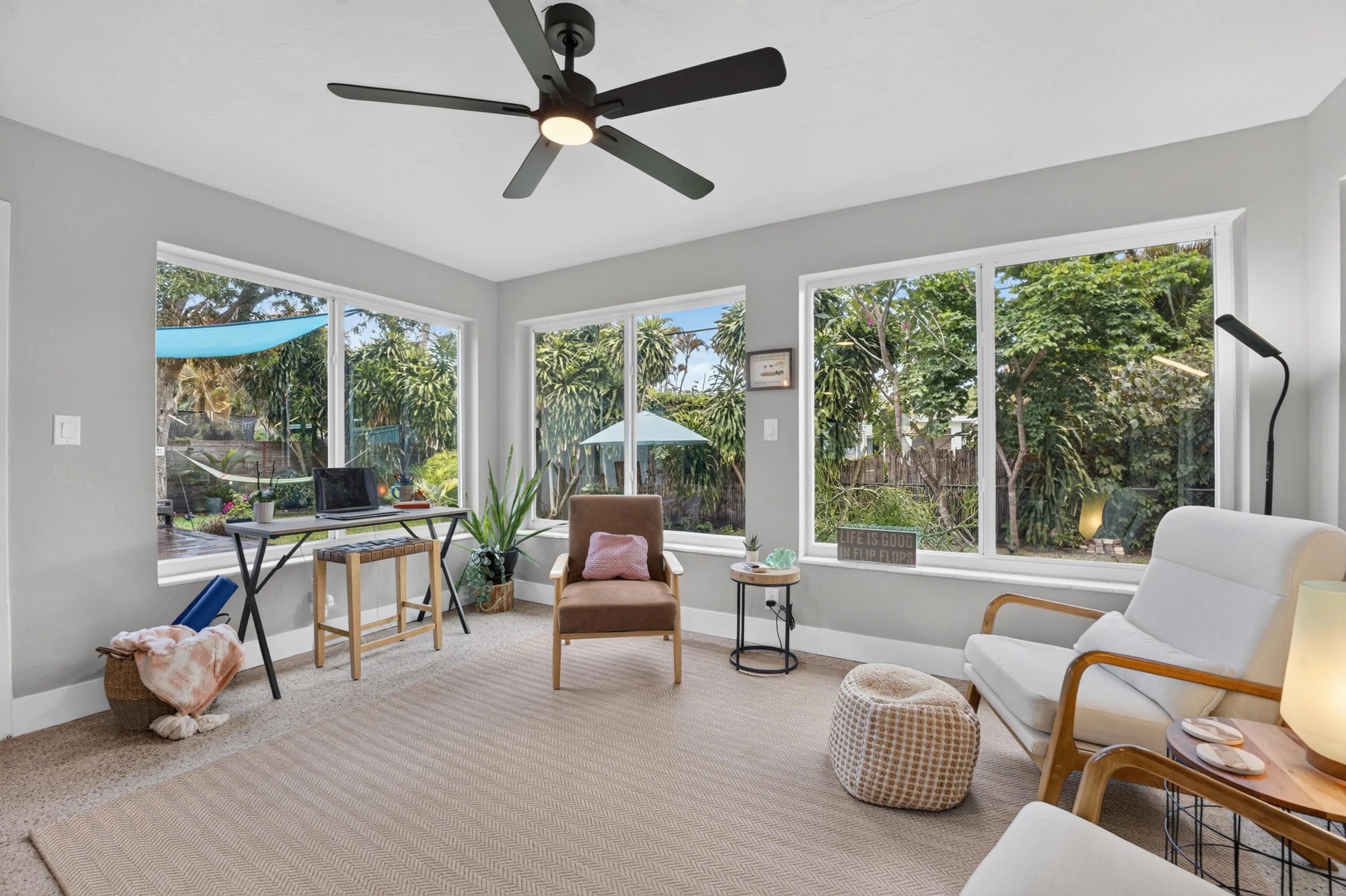 Florida room could be additional living area, dining or office