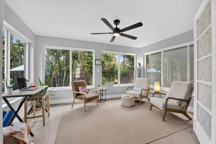 Florida room could be additional living area, dining or office