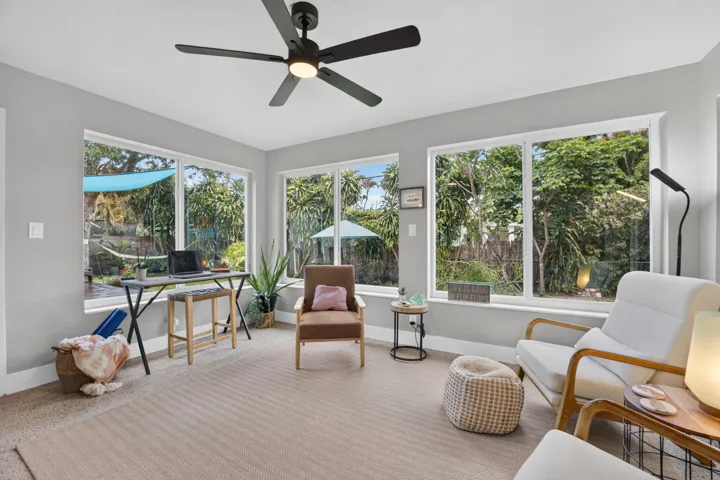 Florida room could be additional living area, dining or office