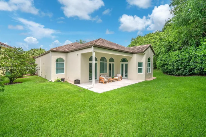 Ample lush green space surrounds the home