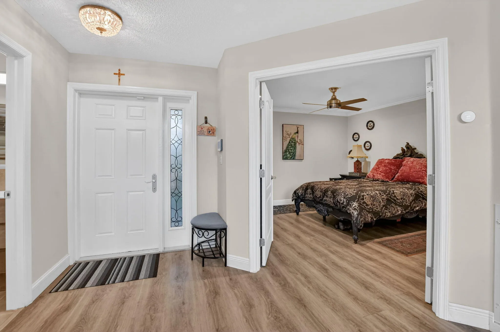 Entrance in with guest bedroom and full bath on 1st floor.