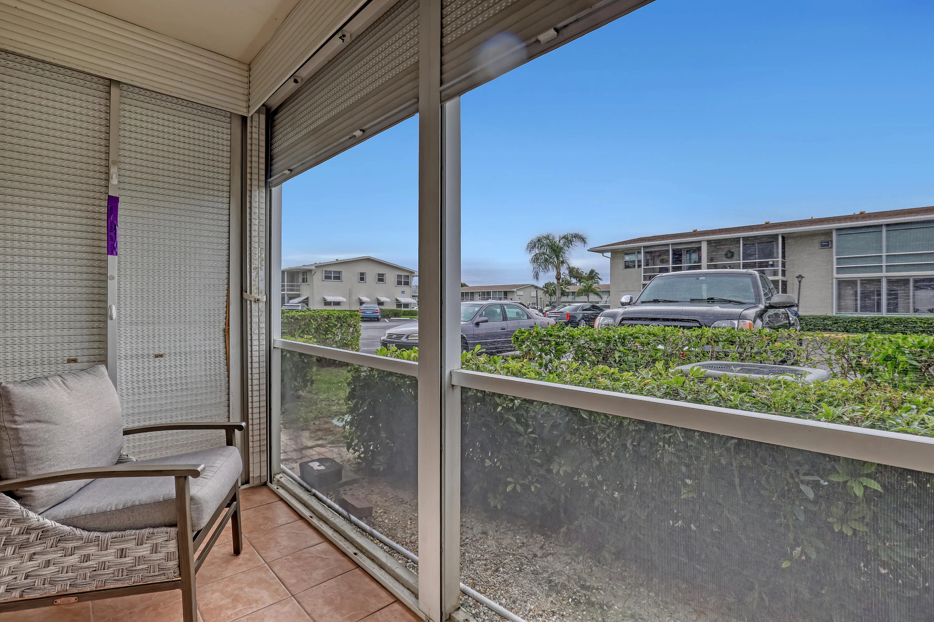 Tiled Patio w/ roll down shutters