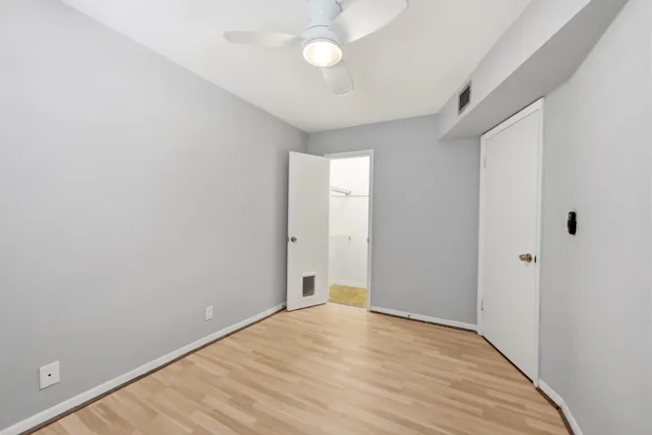 Additional view of the bedroom showcasing its comfortable layout.