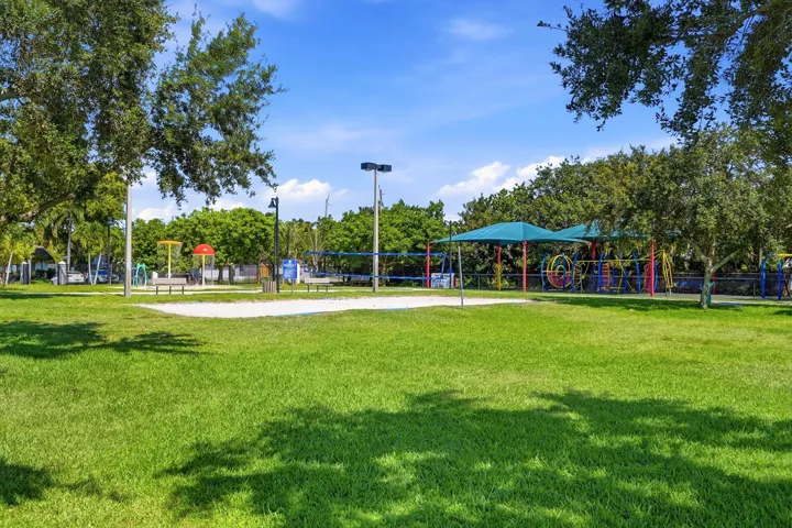 Landscaped park setting enhancing the natural beauty of the neighborhood.