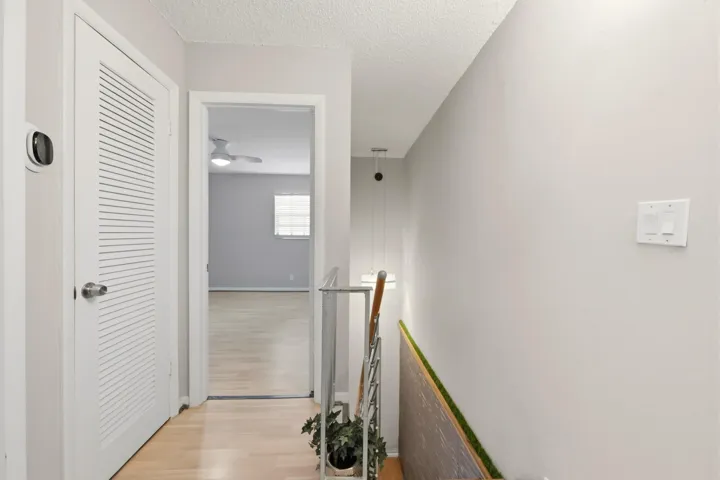 Thoughtfully designed staircase enhancing the home's functional multi level layout.