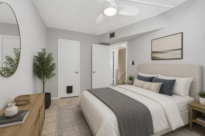 Virtually staged second bedroom demonstrating flexibility for guests, a home office, or additional living space.