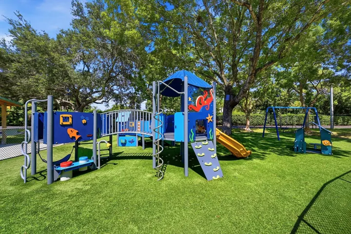 Children's playground offering a fun place for families to gather and enjoy the outdoors.