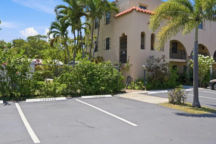 Exterior view of the building on a quiet, tree lined street.