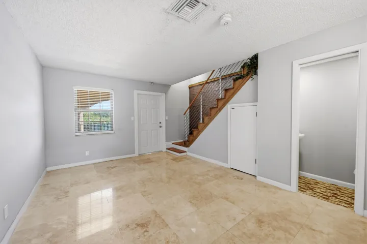 Open living area highlighted by beautiful flooring and a comfortable design.