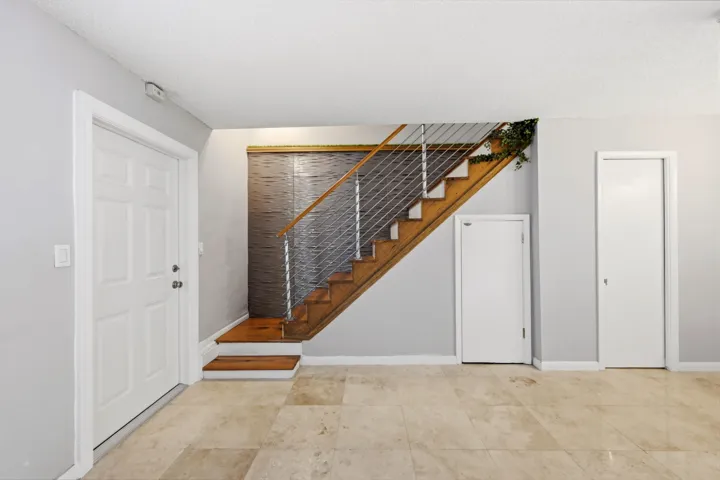 Living room showcasing beautiful flooring and a bright, comfortable living space.