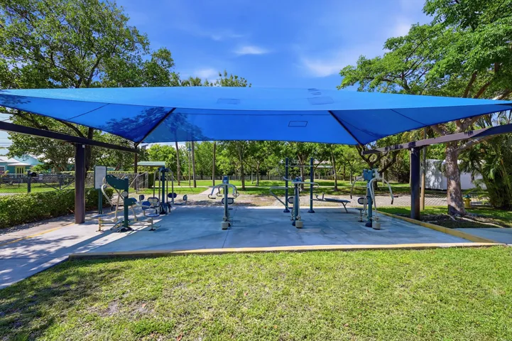 Covered picnic pavilion ideal for relaxing, meeting friends, or enjoying a meal outdoors.