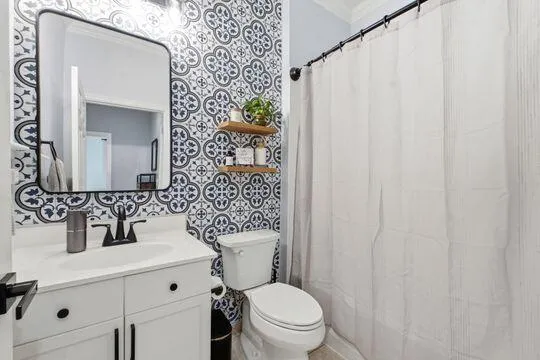 This bathroom has been updated and can be used as powder room or for bedroom #4