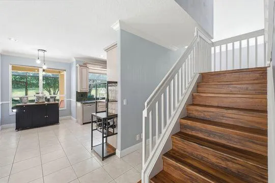 Staircase from family room to second floor