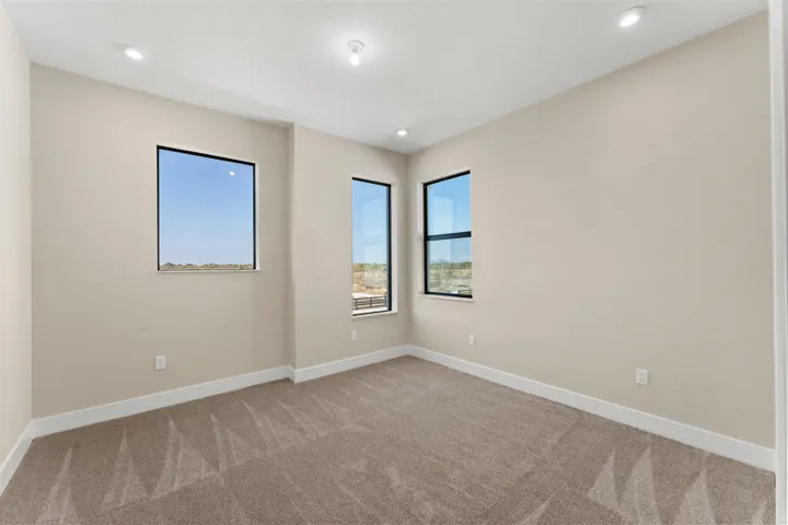 Stock photos represent builder's floorplan