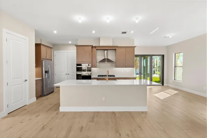 Stock photos represent builder's floorplan