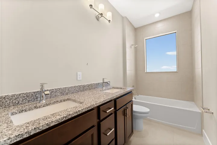 Stock photos represent builder's floorplan