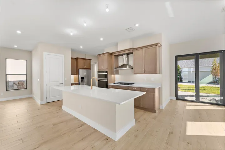 Stock photos represent builder's floorplan