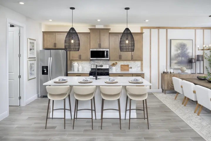 Stock photos represent builder's floorplan