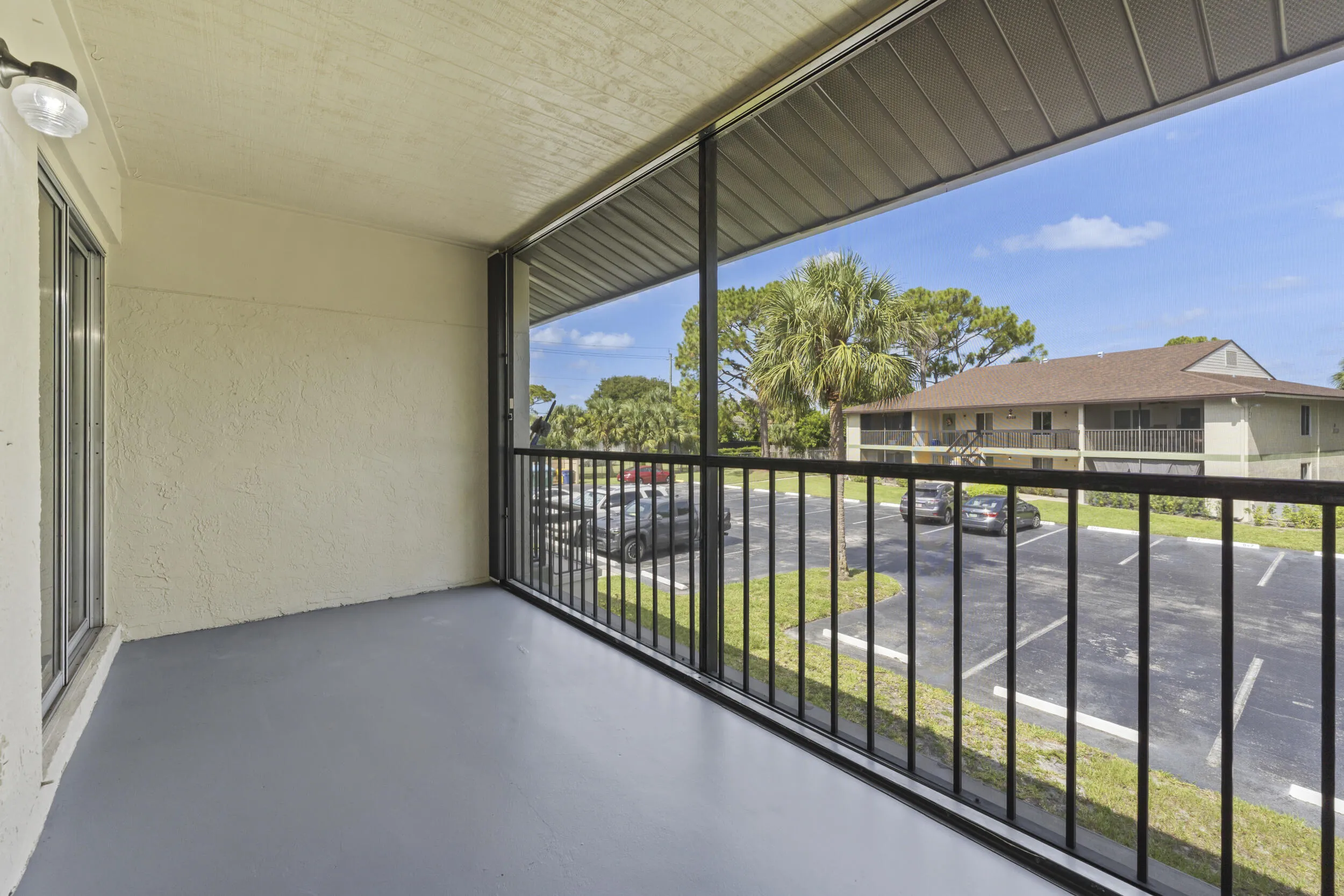 Screen balcony with accordion shutters