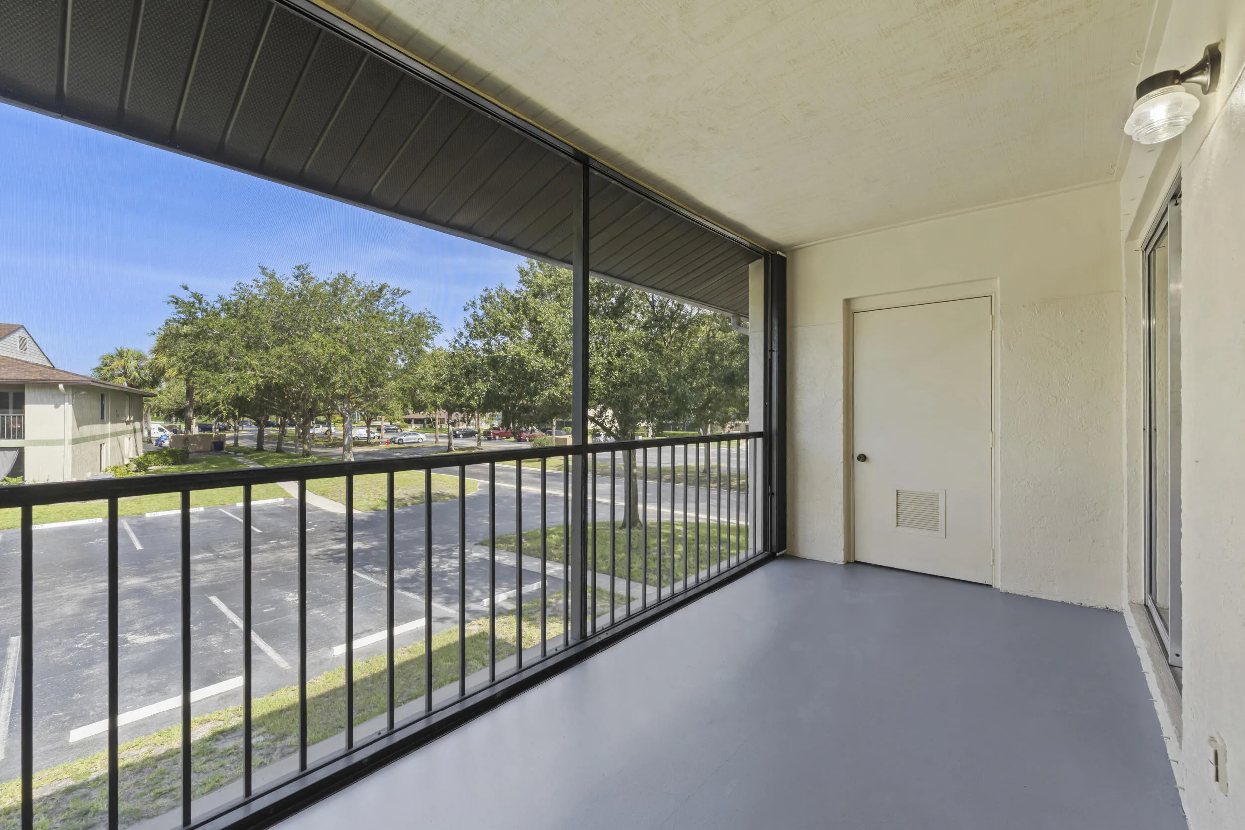 Screen balcony - new screens, accordion shutters and storage closet