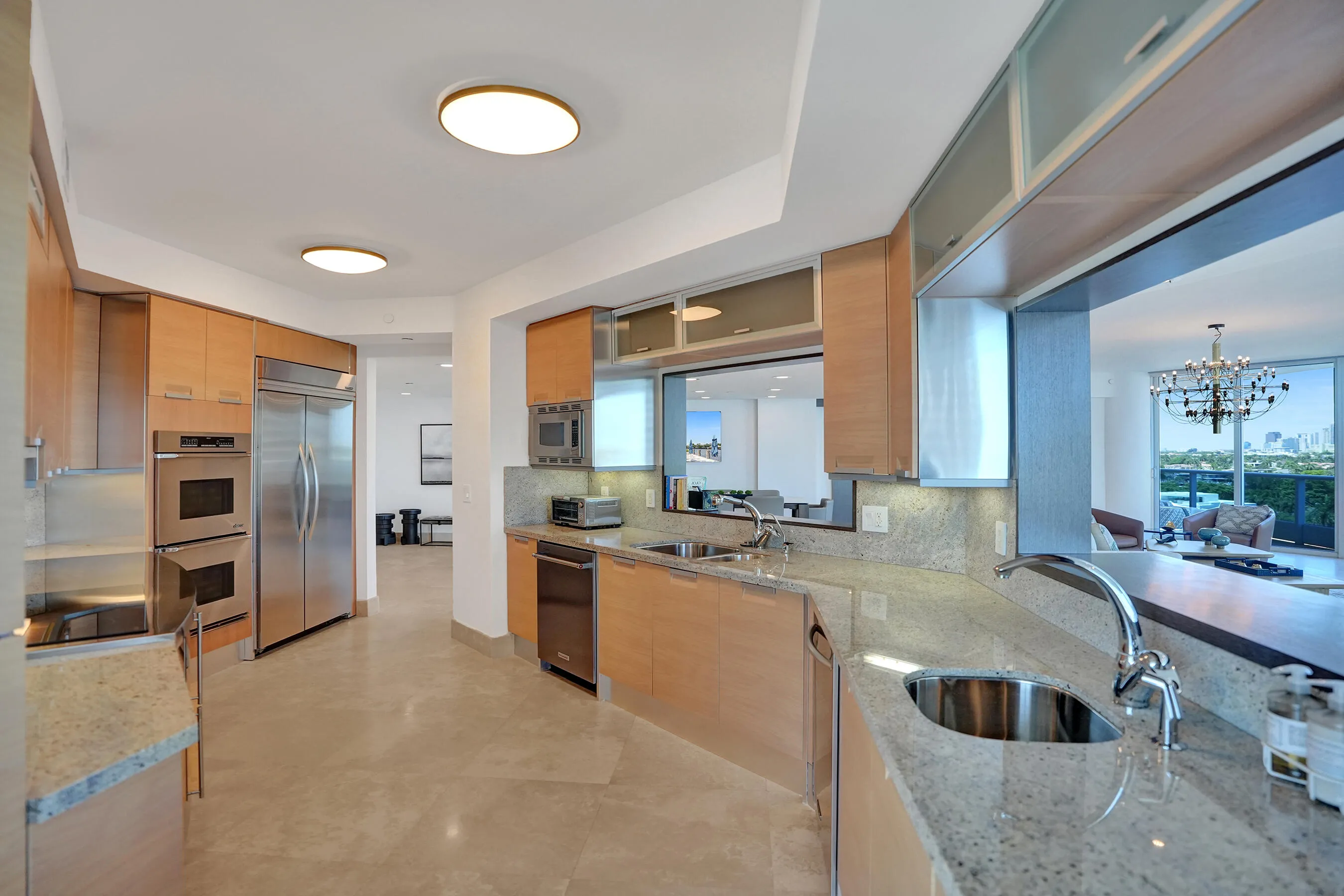 Chef's kitchen with stainless steel appliances, sleek cabinetry, plentiful storage, extra prep sink and under sink reverse osmosis water purifier