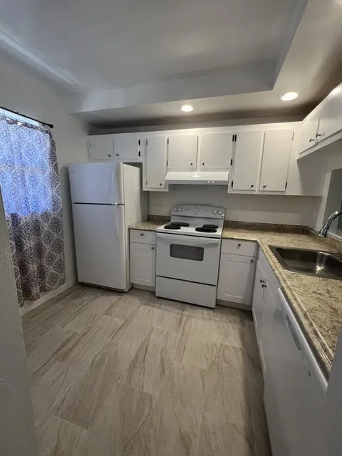 New countertop & lower cabinets. New dish Washer. Beautiful new kitchen tiled floor.