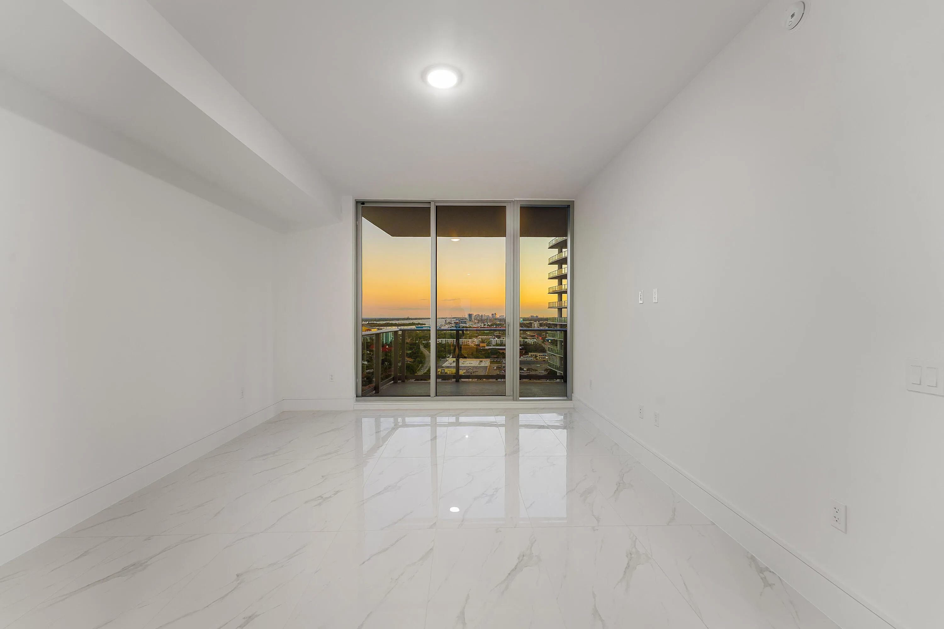 Primary; Sunset; South; Floor-to-Ceiling Sliders open to Terrace