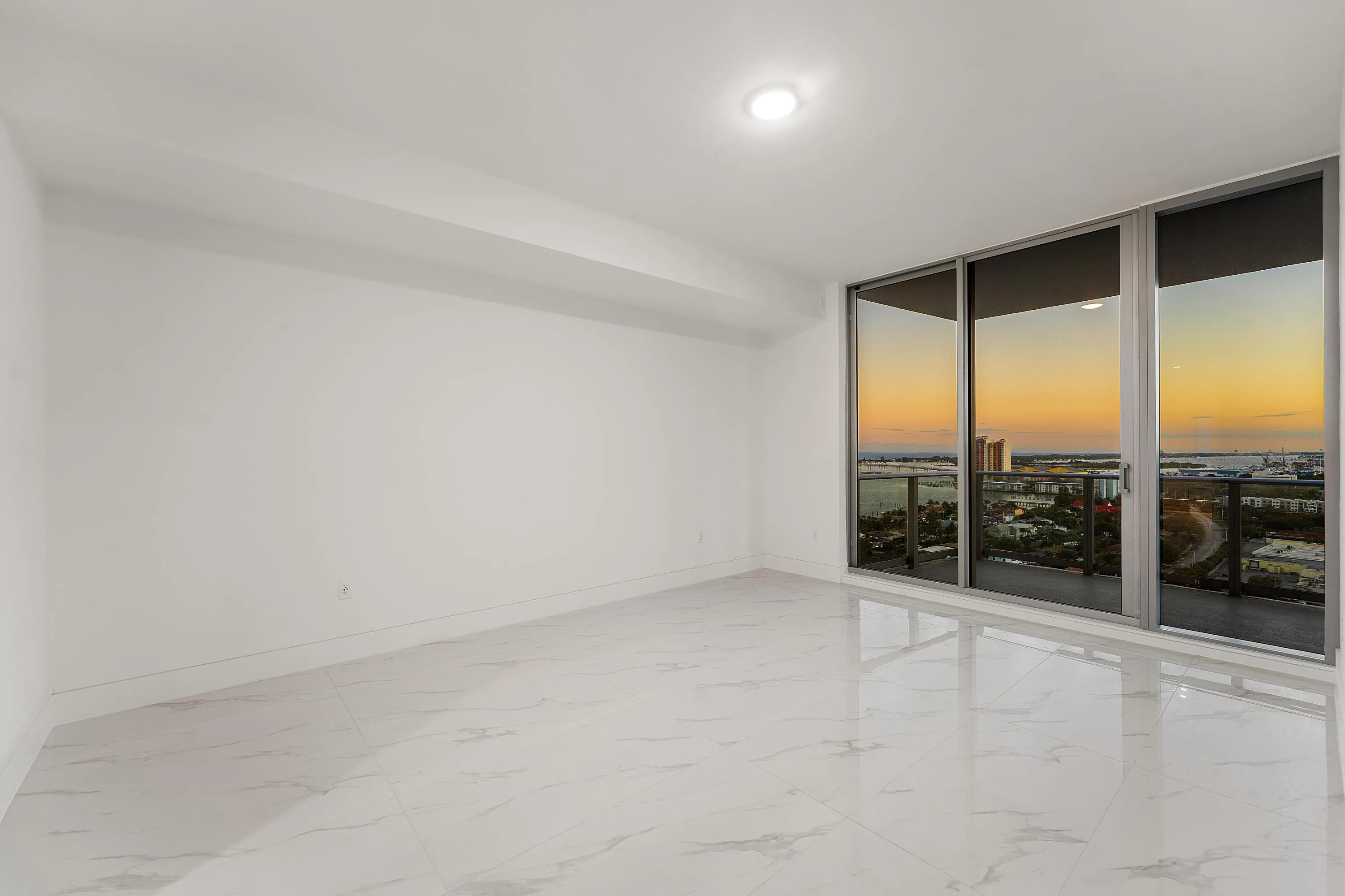 Primary; Sunset; Southeast; Floor-to-Ceiling Sliders open to Terrace