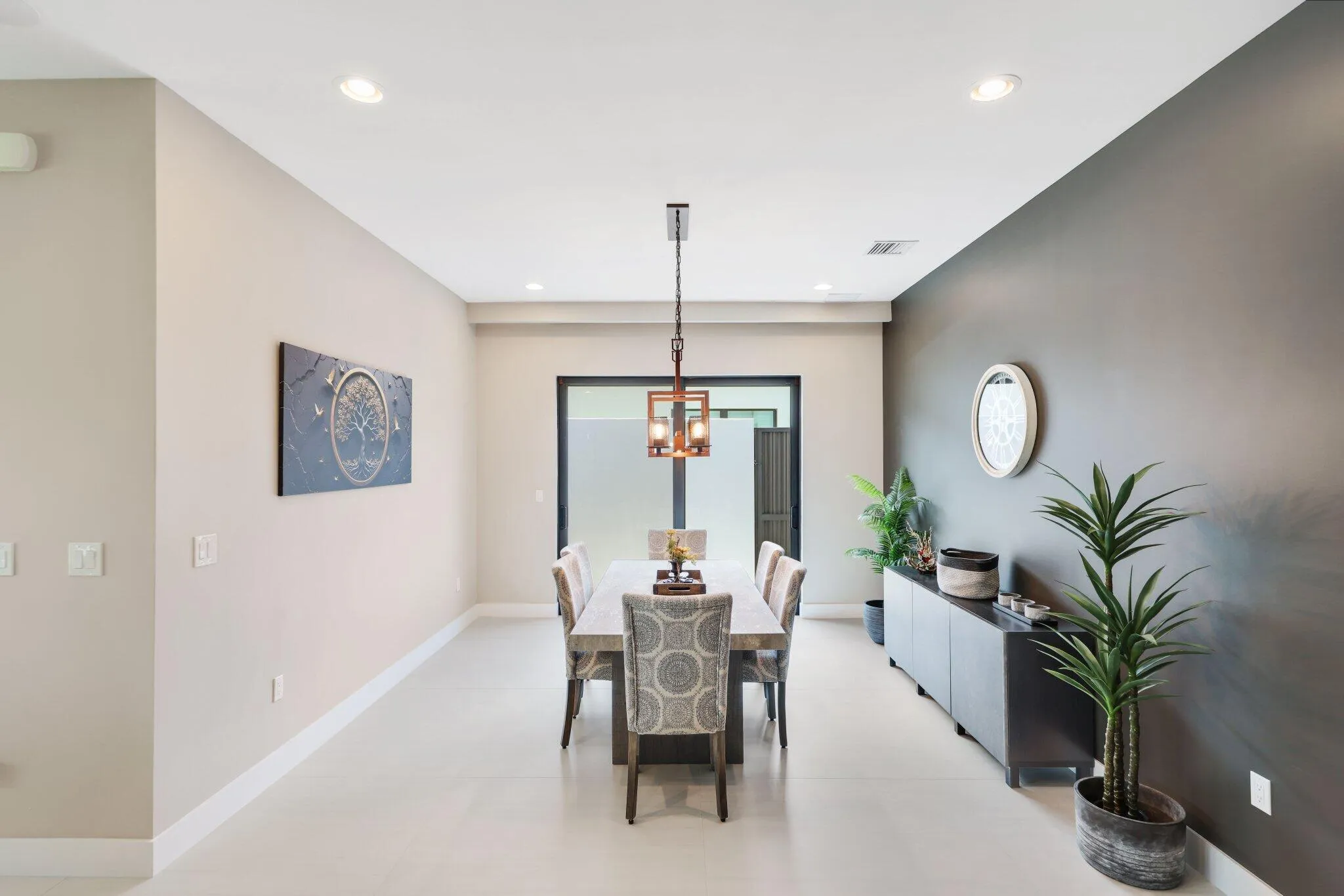 Dining Room with double sliding glass doors leading to outside patio