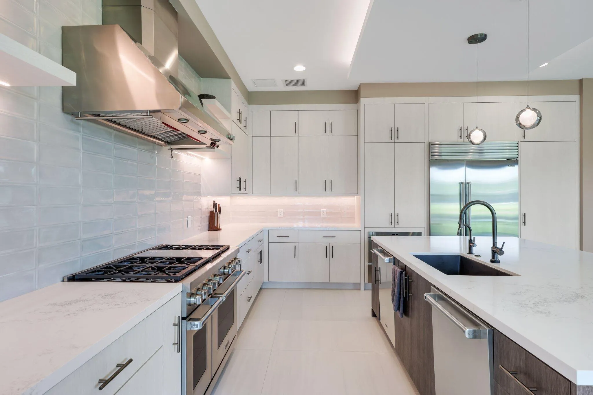 Wolf appliances: 2 dishwahers, microwave + warming drawer.