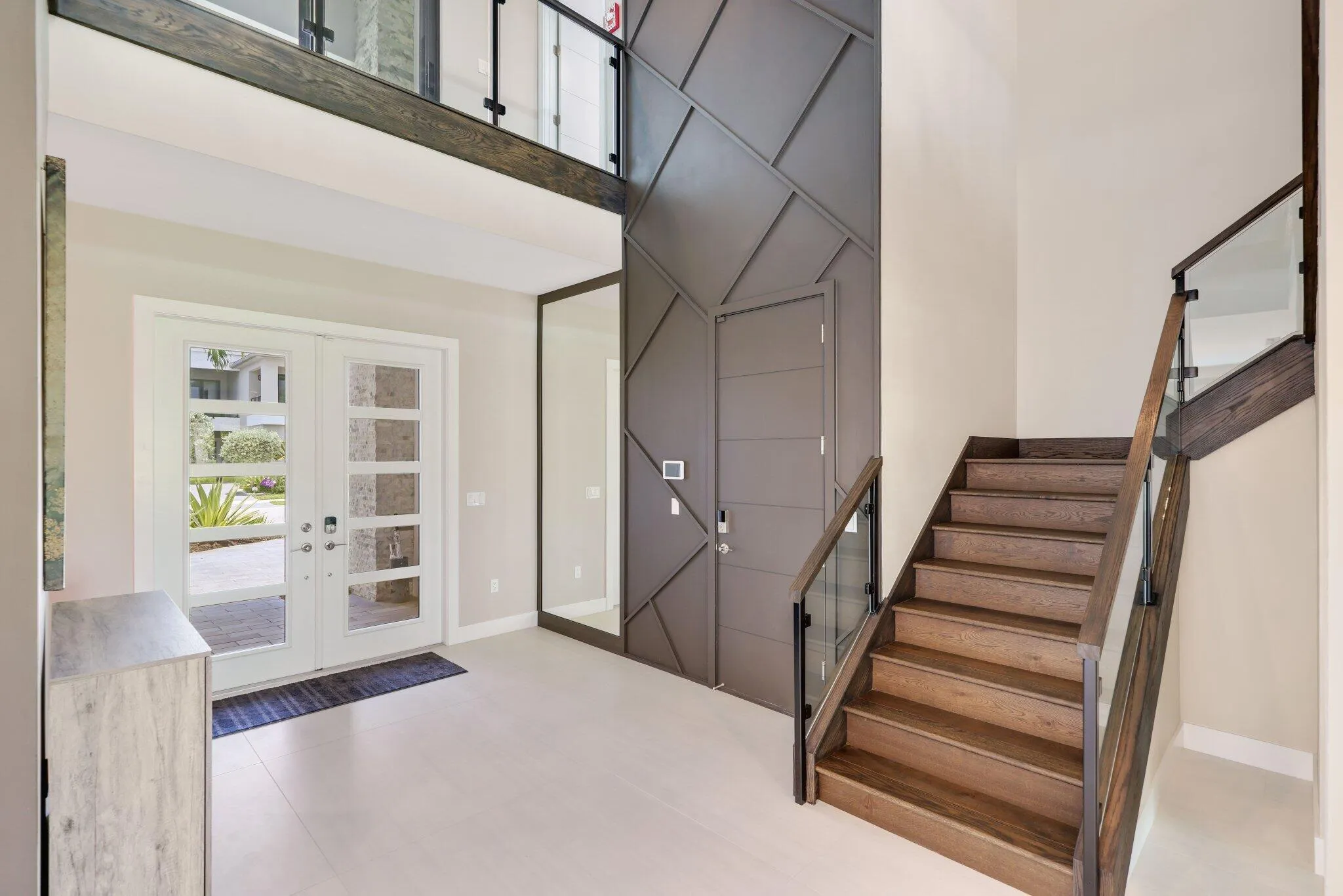 Grand Foyer w 4x4 Italian Porcelain Tile.