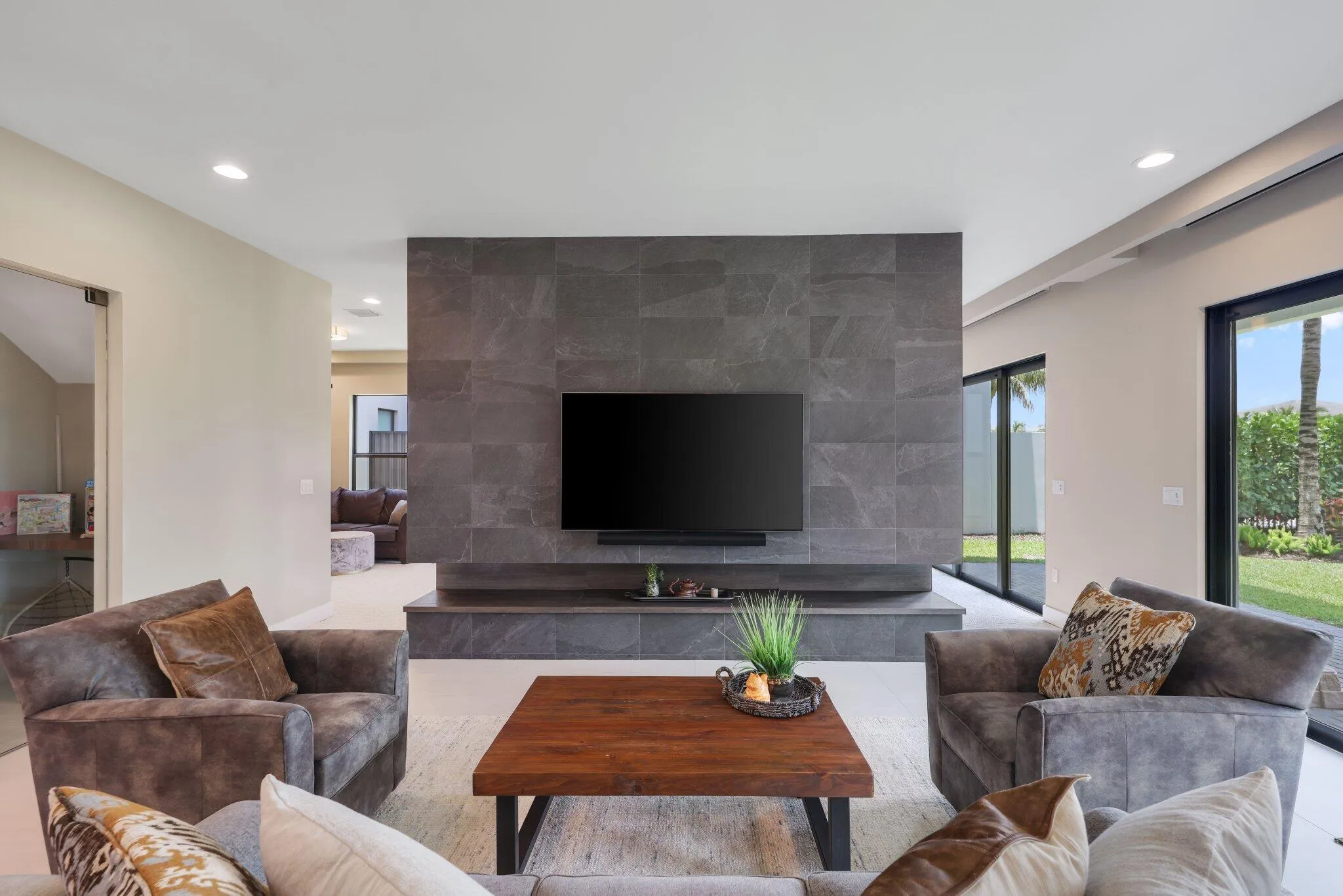 Extended feature wall, tiled on both sides.