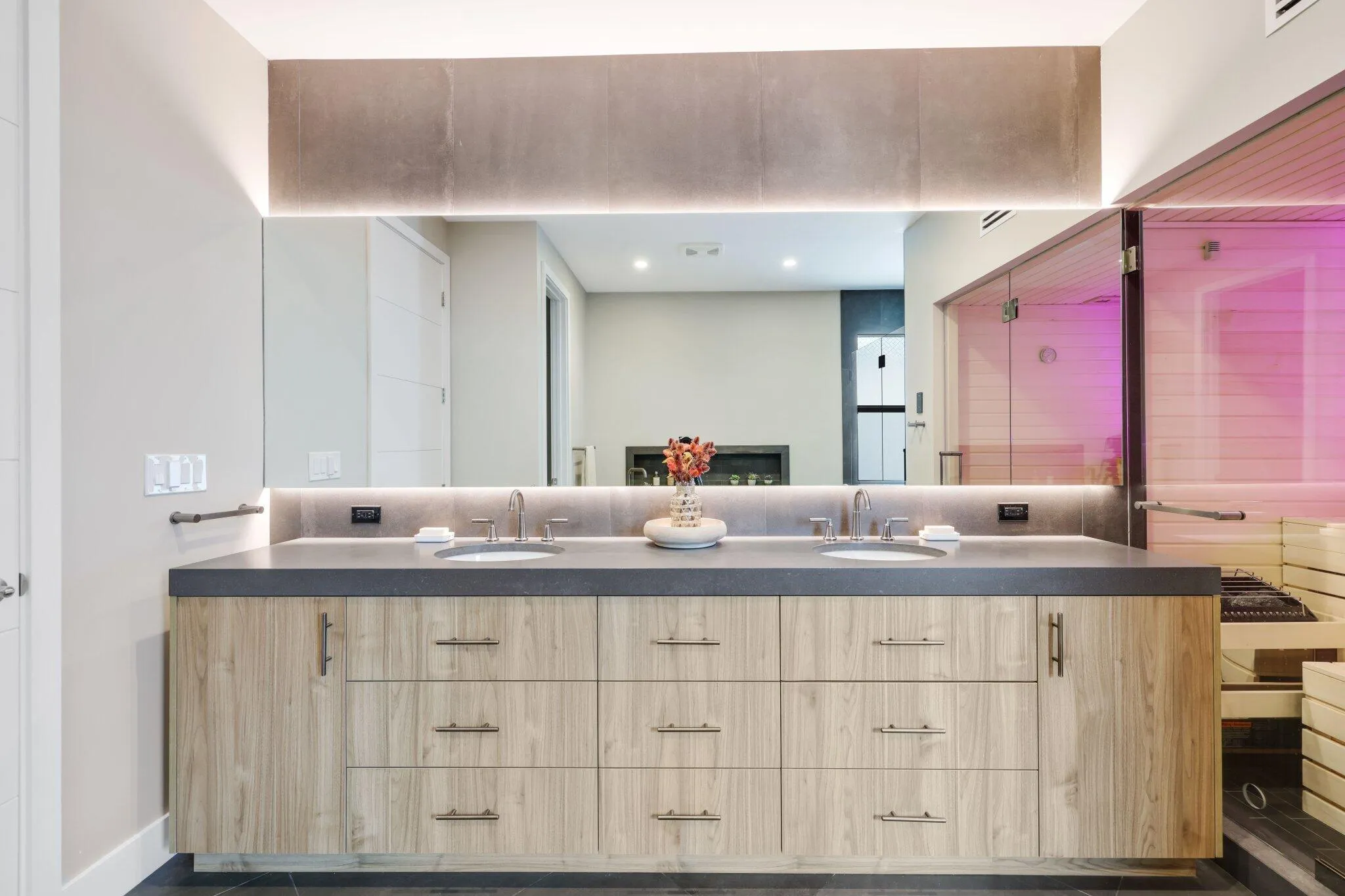 Cabinets with internal outlets and hidden ventilation slats on both ends of the cabinetry
