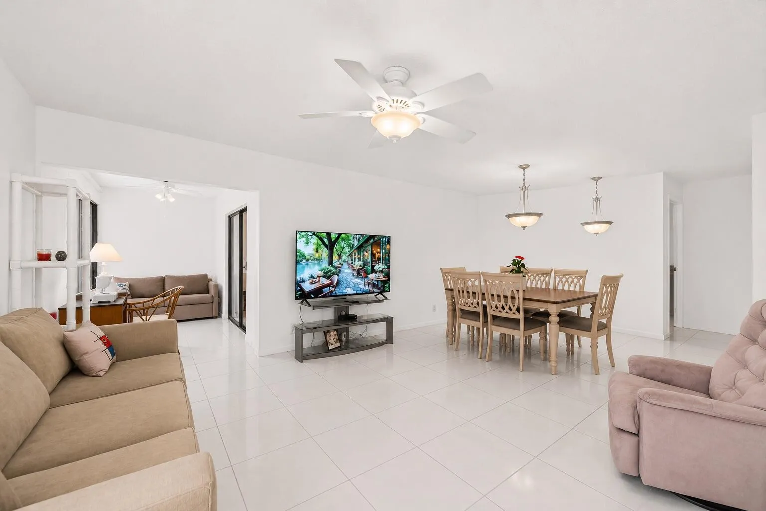 Virtually Enhanced Photo: This image has been digitally enhanced to showcase the home's potential with neutral paint colors and simplified décor. The home's layout and dimensions remain unchanged.